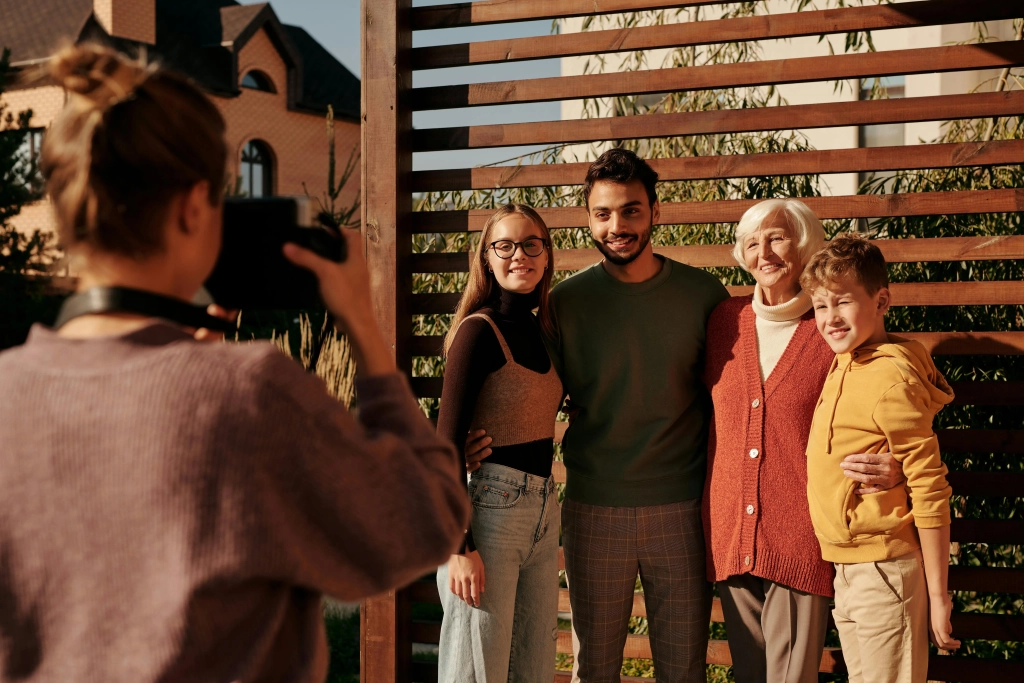 Multicultural family enjoying a fall day outdoors in Cochrane & Calgary, highlighting Dialectical Behavioural Therapy benefits with Najwa Zahr.